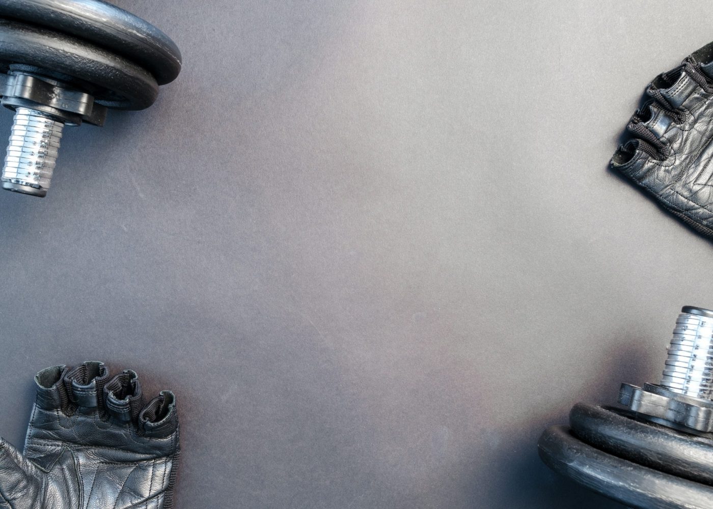 barbells-on-gray-surface-669584
